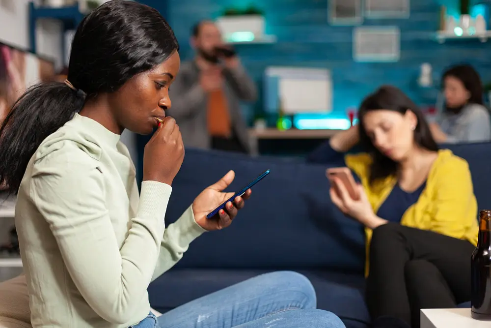 A person feeling lonely despite being hyperconnected